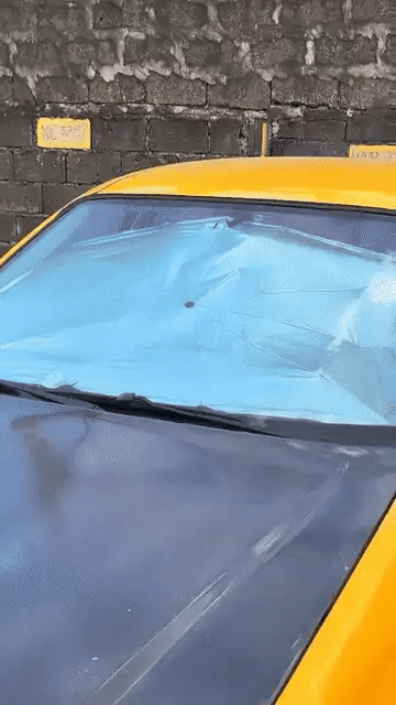 Portable Denx Car Umbrella by My Store, shown protecting a vehicle from sun and rain in a compact, foldable design.
