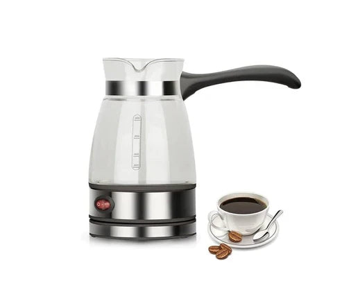 Electric water kettle by ZK, made of stainless steel with a black handle and lid, boiling water on a kitchen countertop.