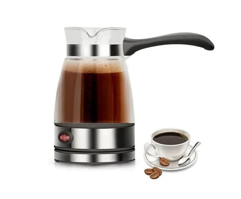 Electric water kettle by ZK, with a sleek design, stainless steel body, and a black handle for easy pouring.